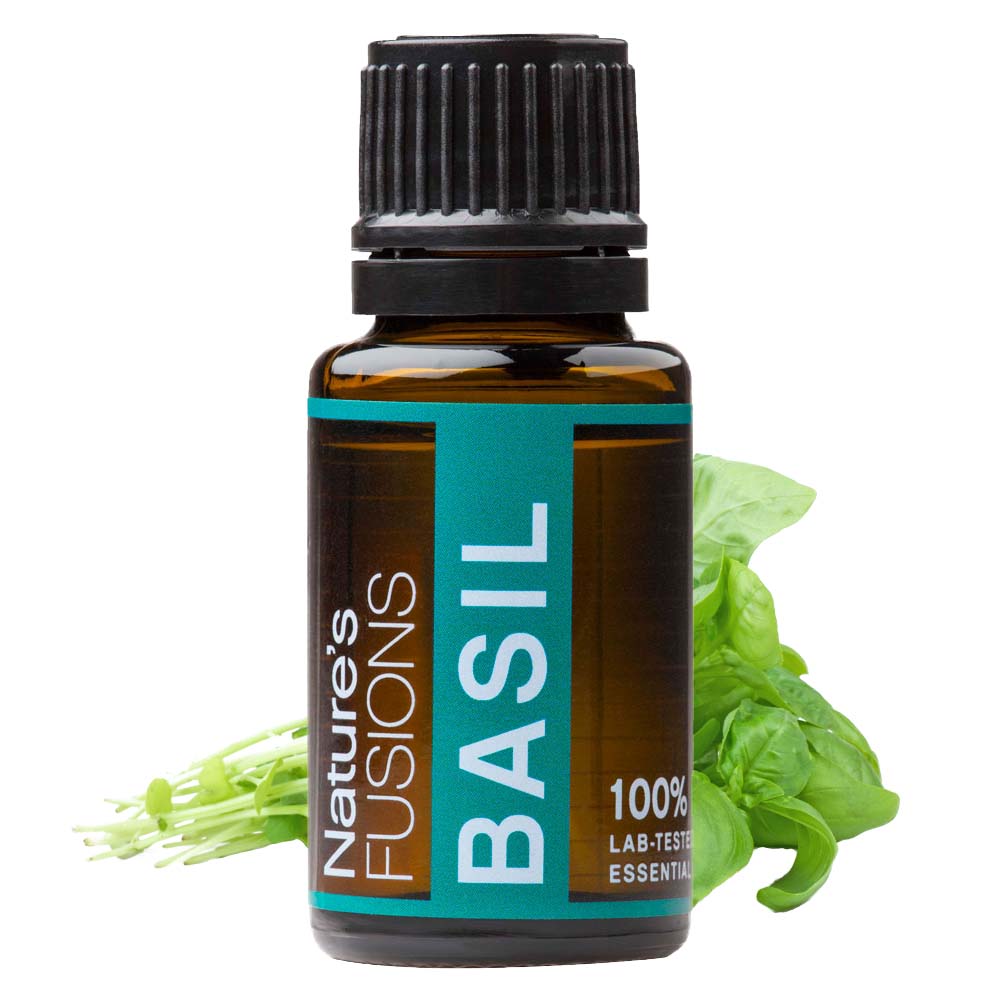 basil essential oil 15 ml bottle with leaves