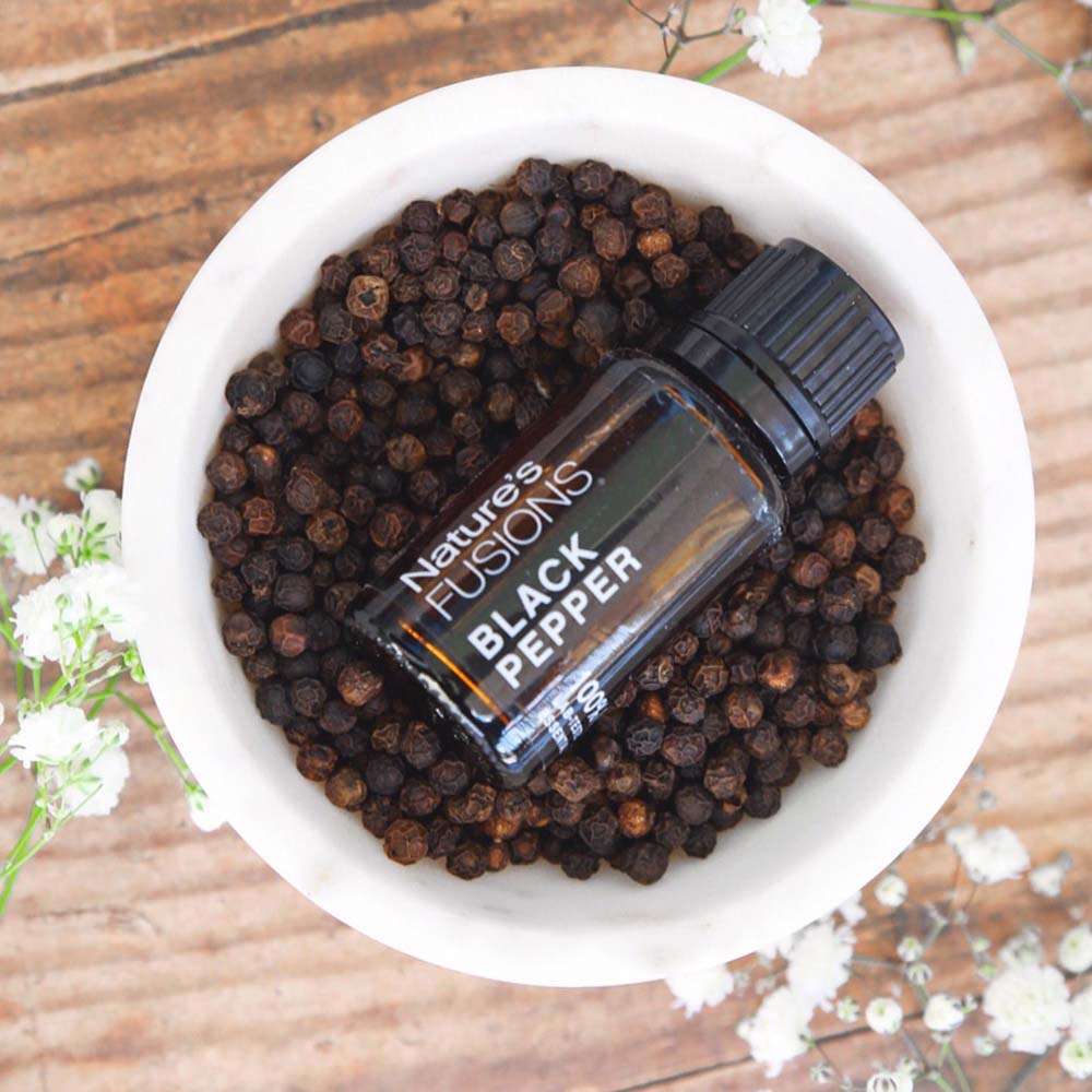black pepper essential oil peppercorn photo