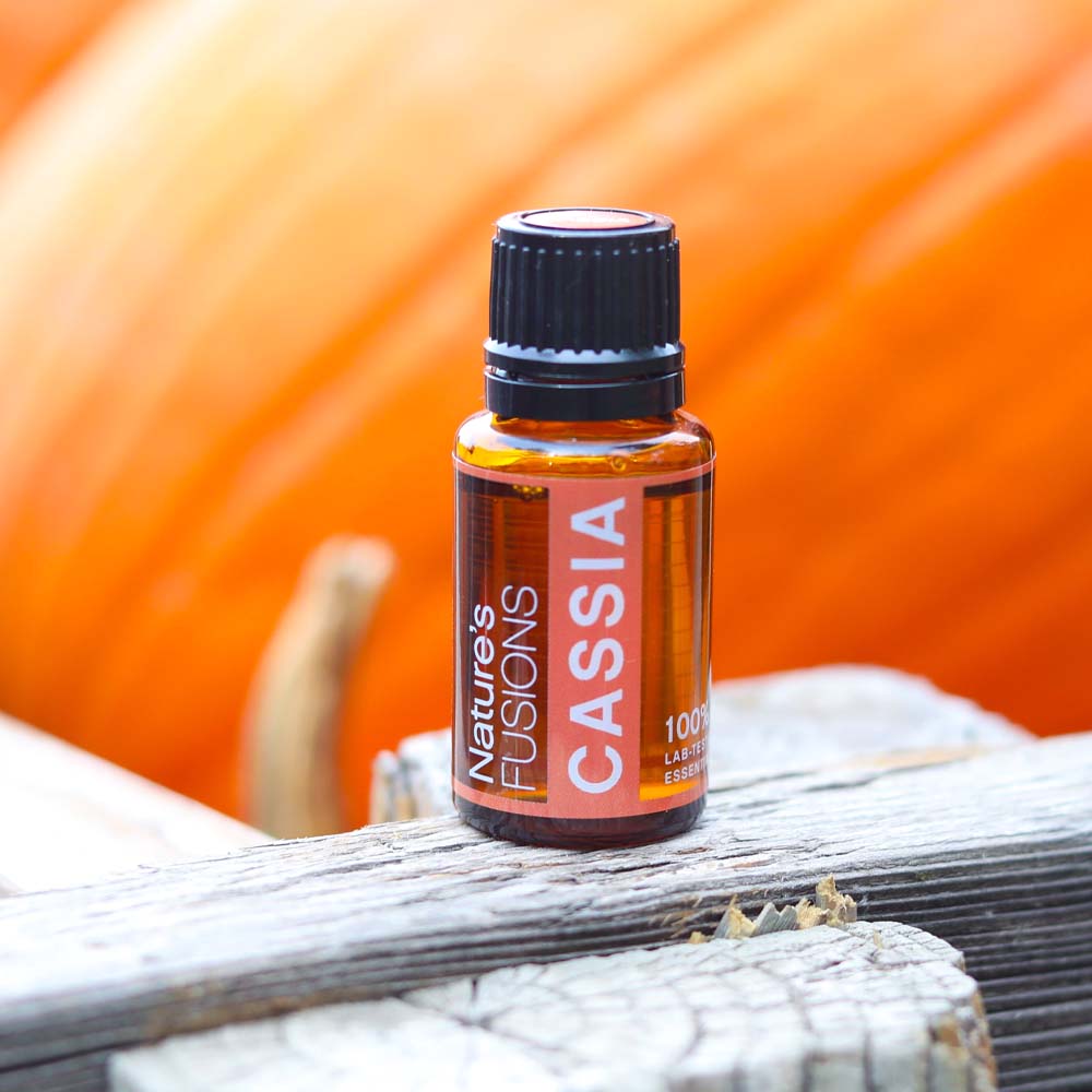 cassia essential oil bottle pumpkin outdoor photo