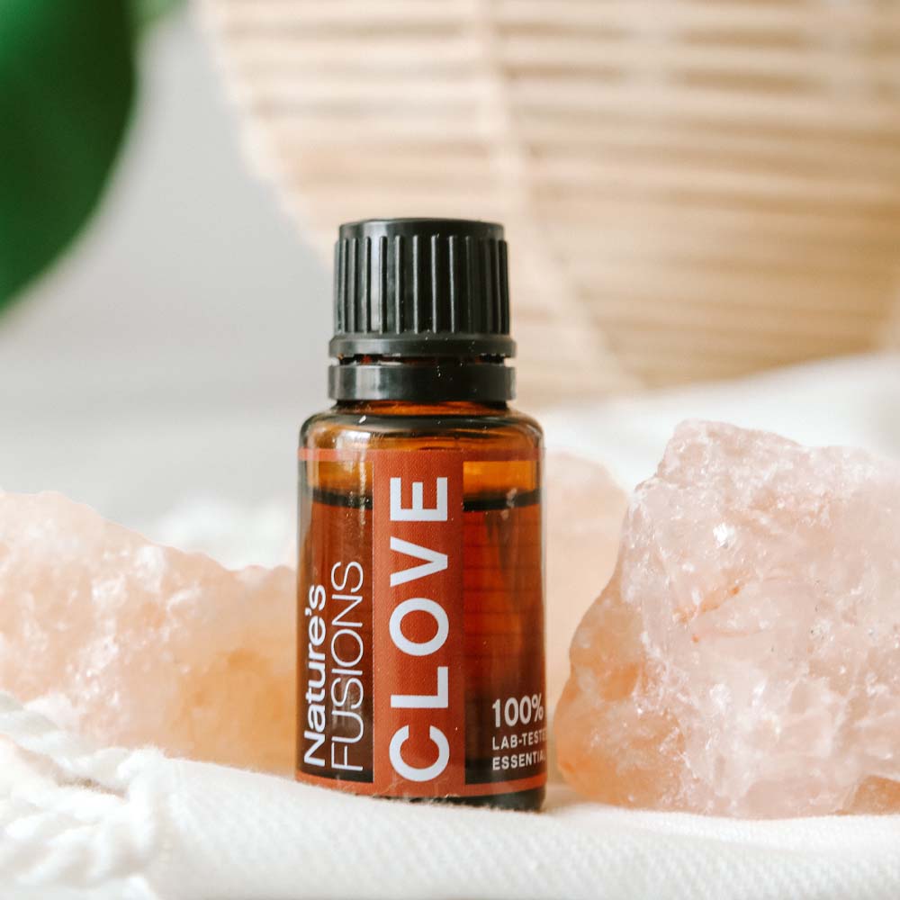 clove essential oil with salt crystals photo