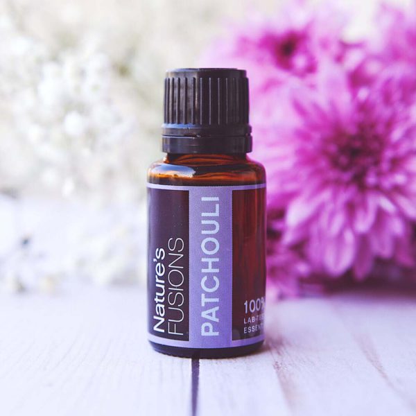 patchouli essential oil with flowers