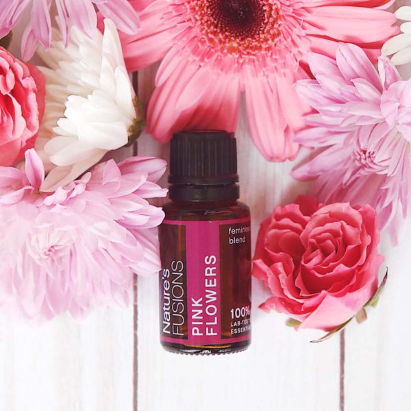 Pink Flowers essential oil blend with white to red flowers