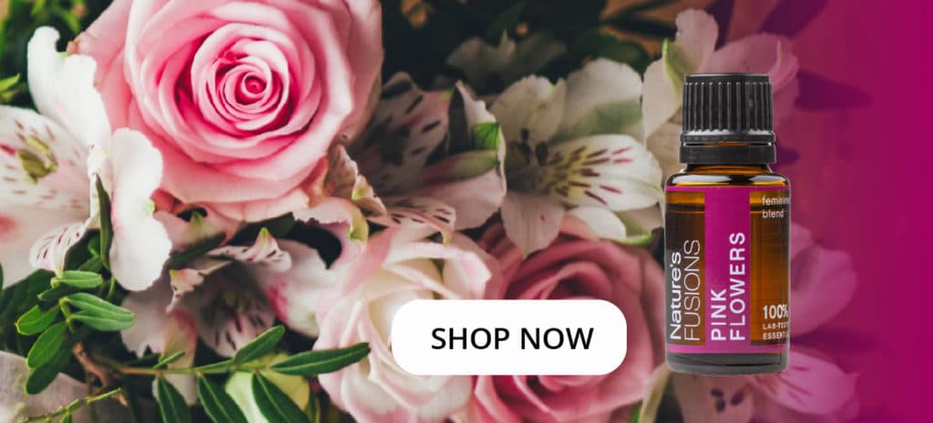 flower bouquet with Pink Flowers oil bottle and clickable “SHOP NOW”