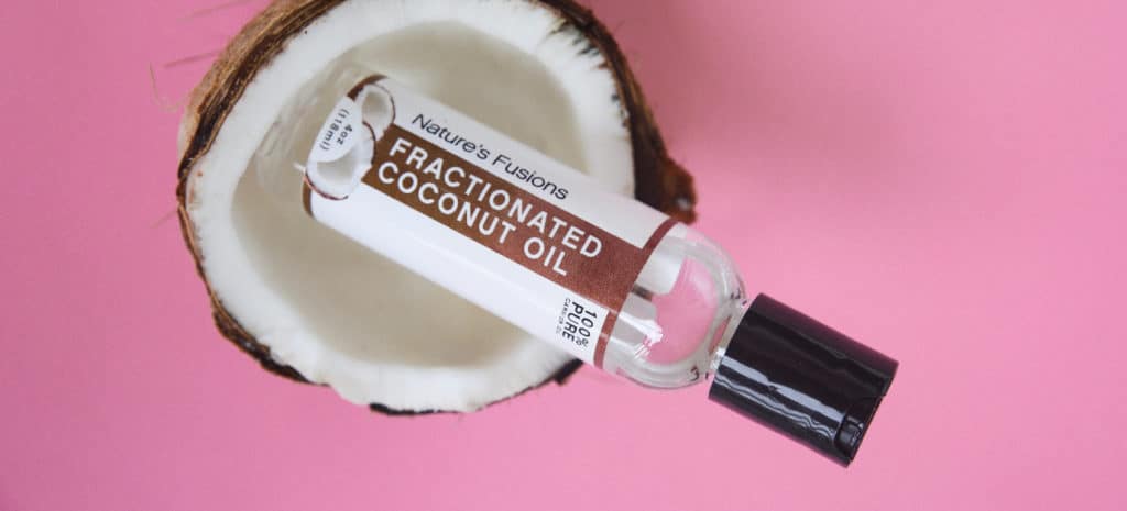 coconut oil bottle in a coconut