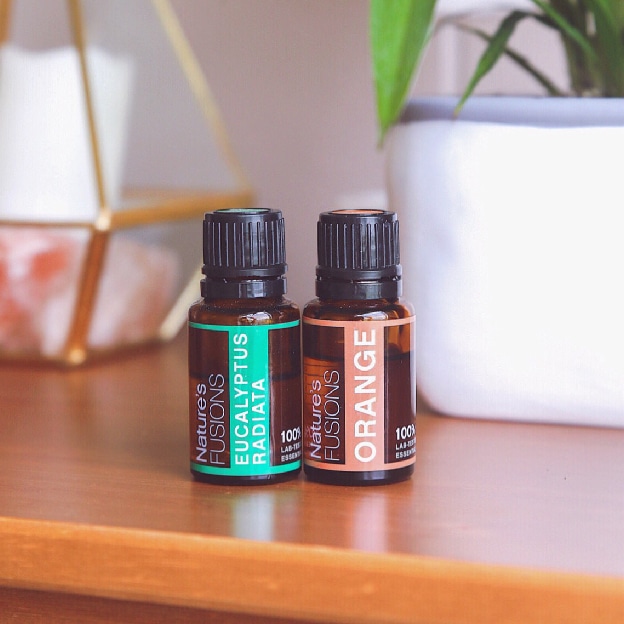 eucalyptus and orange oils on table