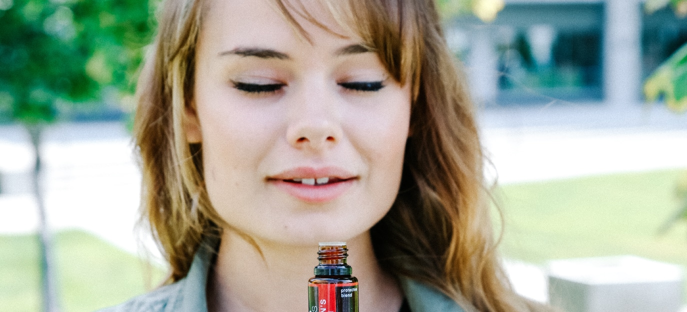 a relaxed model smelling Dragon’s Breath