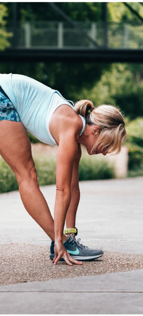 woman stretching outside