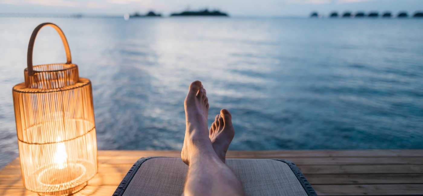 relaxing on pier with lantern