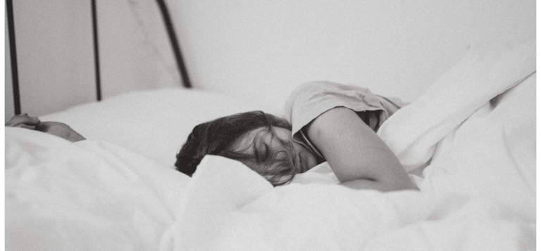 woman sleeping in bed