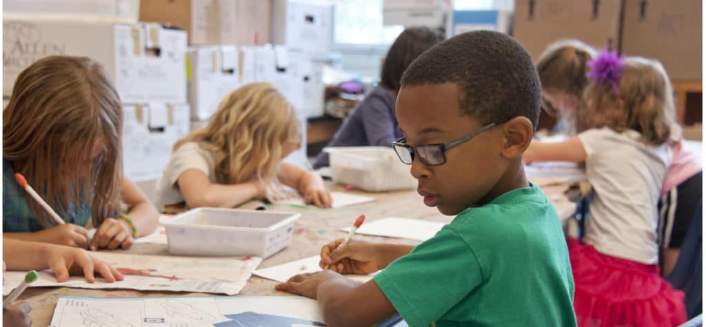 students with books writing