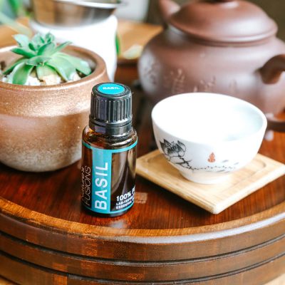 basil essential oil table setting photo