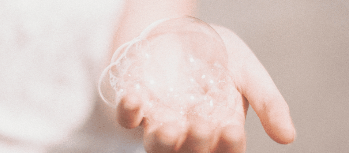 soap bubbles on hand