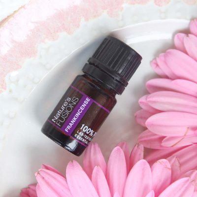 frankincense essential oil with flowers